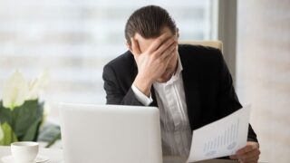 Businessman receiving challenging news from the VOC program