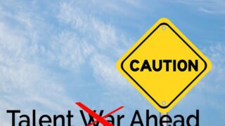 Caution sign - Retain top talent instead of joining the talent war