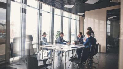 Business team meeting a CX manager in a conference room